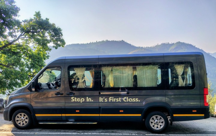 The Urbania parked with a mountain backdrop