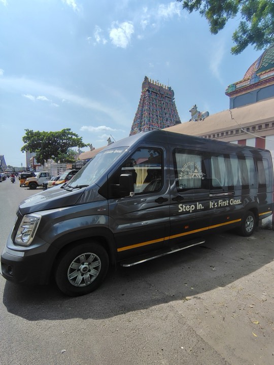 The Urbania parked beside a temple